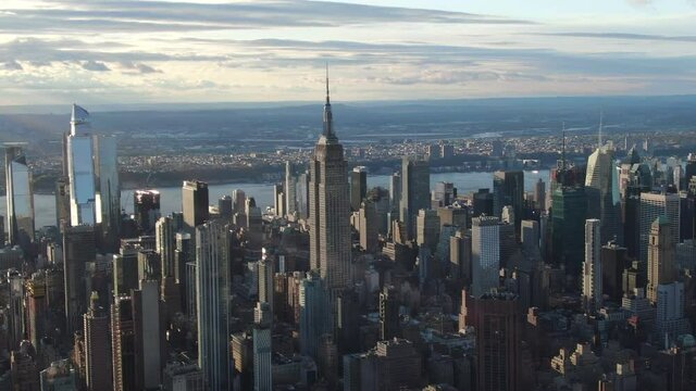 Beautiful slow and smooth brief aerial of empire state building skyline