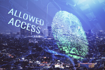 Double exposure of finger print hologram and cityscape background. Concept of personal security.