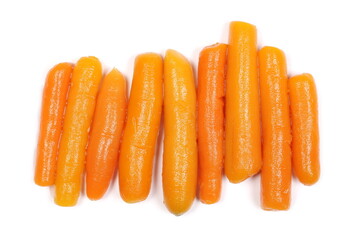 Cooked baby carrots isolated on white background, top view