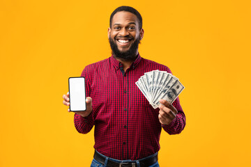 Afro guy holding mobile phone and bunch of money cash