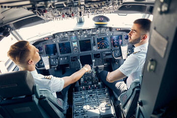 The pilots of aircraft prepares for landing at the airport