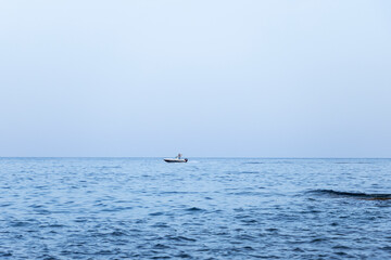 boat and motorboat in the sea sailing