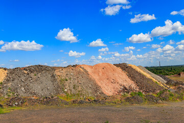 View of slag heaps of iron ore quarry. Mining industry