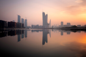 Fototapeta na wymiar Bahrain skyline at sunrise with beautiful hue on the sky