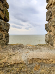 Sea view from a stone window.