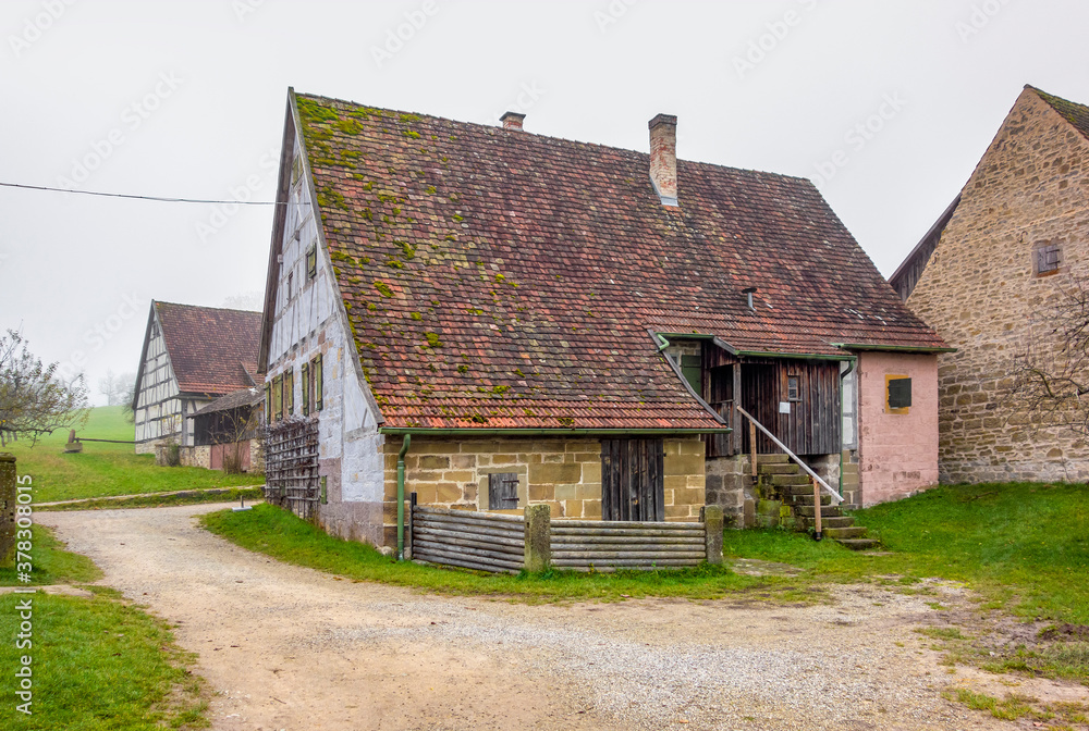 Wall mural old farmhouse at autumn time