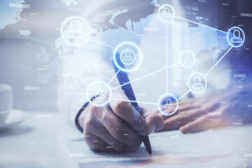 Man's hands working with notes background. Social networking concept.