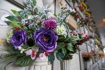 Close up of ornate blue flowers in the monumental cemetery in Milan