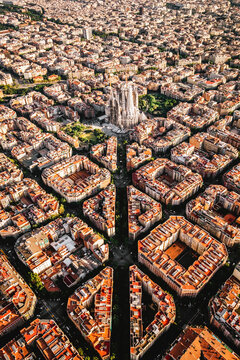 Aerial view of the residential Eixample district of Barcelona, with the Sagrada Familia, Designed by Catalan architect Antoni Gaudi