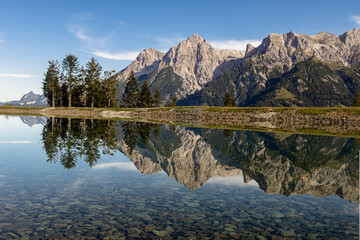 Reflection of mountains in Prinzensee lake at Natrun Austria