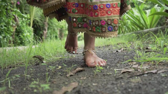 Foot Closeup of Women Running Barefoot in Indian Cultural Dress