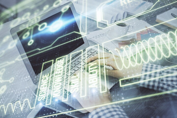 Science hologram with man working on computer on background. Concept of study. Double exposure.