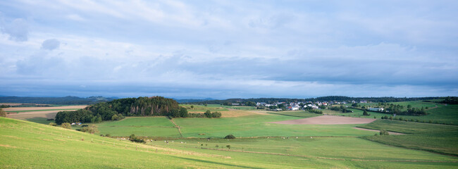 Fototapeta na wymiar village in landscape of german eifel in summer
