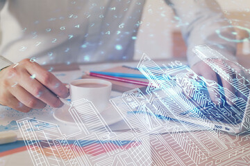 High tech city drawing with businessman working on computer on background. Smartcity concept. Double exposure.