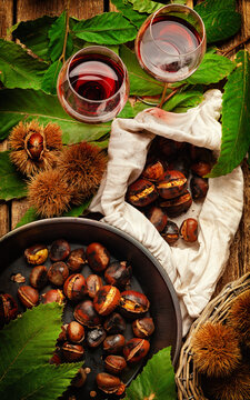 Roasted chestnuts in iron skillet