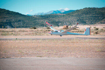 glider plane landing on the airfield