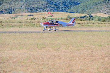 plane landing on airfield