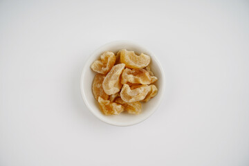 gooseberry candy in White bowl over white background                     