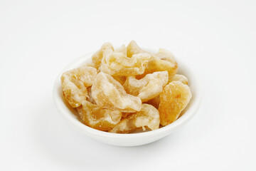 Gooseberry candy in bowl isolated on white background