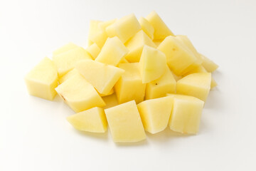 Raw potatoes on a white background