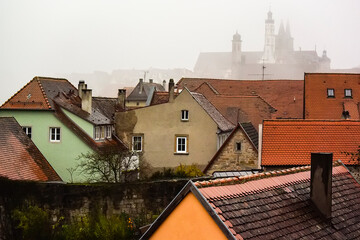 View from town wall of facades and roofs of medieval old town Rothenburg ob der Tauber, Bavaria,...