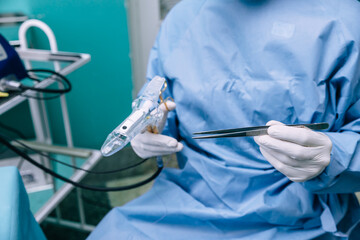 Surgical instruments for operation with a hand in a surgical glove with the tool