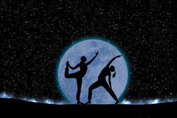 Fototapeta premium two women silhouette in yoga position against a black starry sky with copy space for your text