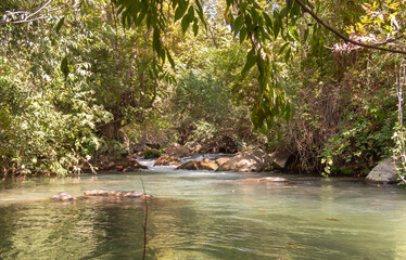 The bed  of the swift mountainous Hermon River with crystal clear waters in the Golan Heights in northern Israel