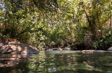 The bed  of the swift mountainous Hermon River with crystal clear waters in the Golan Heights in northern Israel