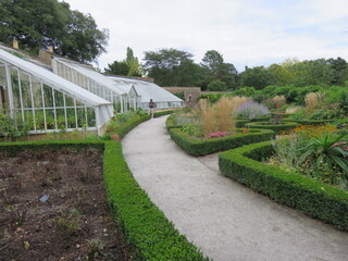 Formal garden with greenhouse