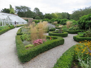 Formal garden with greenhouse