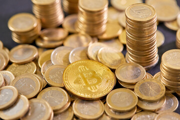 Stock Photo - Euro coins. Euro money. Euro currency.Coins stacked on each other in different positions. Money concept