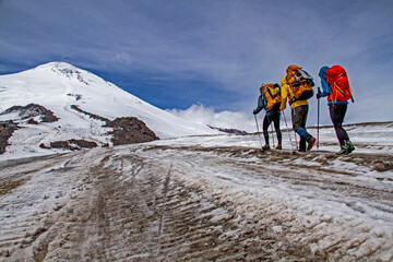 No destination too far no mountain too high. Hikers on the way to Mount Elbrus