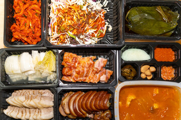 bossam set, boiled pork with side dishes, one of Korea's delivery foods