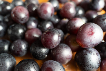 dark purple grapes in glass bowls