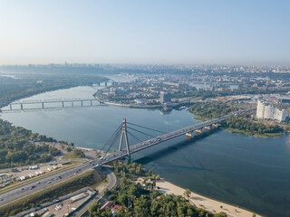 Naklejka premium North bridge over the Dnieper river in Kiev. Aerial drone view.