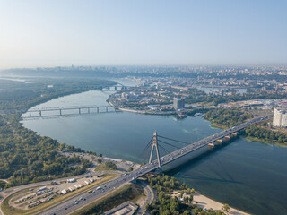 Naklejka premium North bridge over the Dnieper river in Kiev. Aerial drone view.