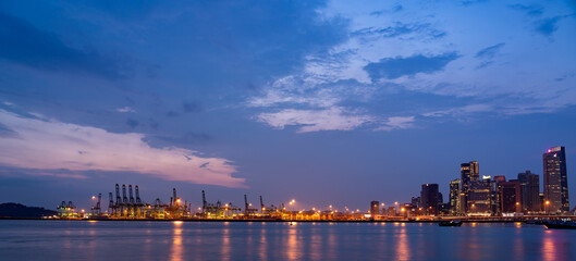 Fototapeta na wymiar Wide panorama of Singapore Residential area at dusk.