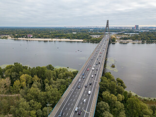 North bridge over the Dnieper river in Kiev. Aerial drone view.