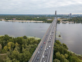 Fototapeta premium North bridge over the Dnieper river in Kiev. Aerial drone view.