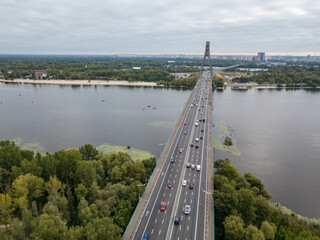 North bridge over the Dnieper river in Kiev. Aerial drone view.