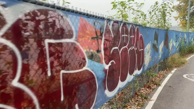 Graffiti, Street Art on chain link fence