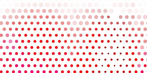 Light pink vector background with spots.