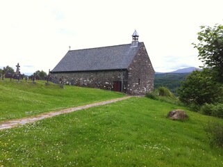 Fototapeta na wymiar Scottish highlands landscape with church