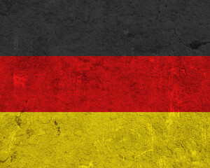 Fahne von Deutschland auf verwittertem Beton