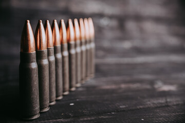 Copy space rifle cartridges are in a row. Self-defense concept