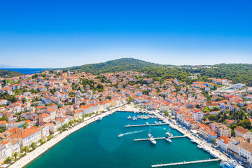 Fototapeta na wymiar Aerial view of town of Mali Losinj on the island of Losinj, Croatia, marina and sail boats on Adriatic coastline