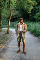 Cute young man posing in different locations. On an island. 