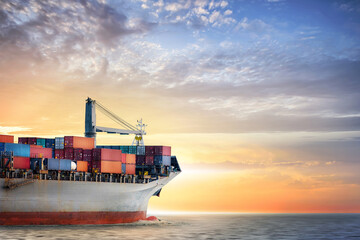 Container cargo ship in the ocean at sunset sky, Global business logistics import export...