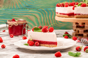 Homemade cheesecake with fresh raspberries and mint for dessert, Delicious cheesecake with berries, healthy organic summer dessert pie cheesecake